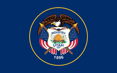 The Utah flag featuring the industrial symbol, the beehive. Image via Wikimedia commons.