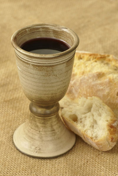 The deep red wine that comes from grapes strongly symbolizes the blood of Jesus Christ in the administration of the sacrament. image via oneclimbs.com