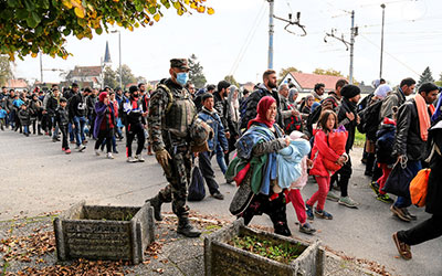 Syrian migrants and refugees pass through Slovenia. Image via Wikimedia commons.