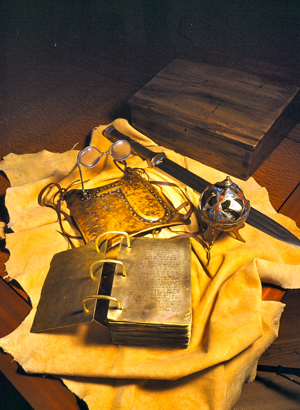 Golden plates and other artifacts. Image via Wikimedia commons.