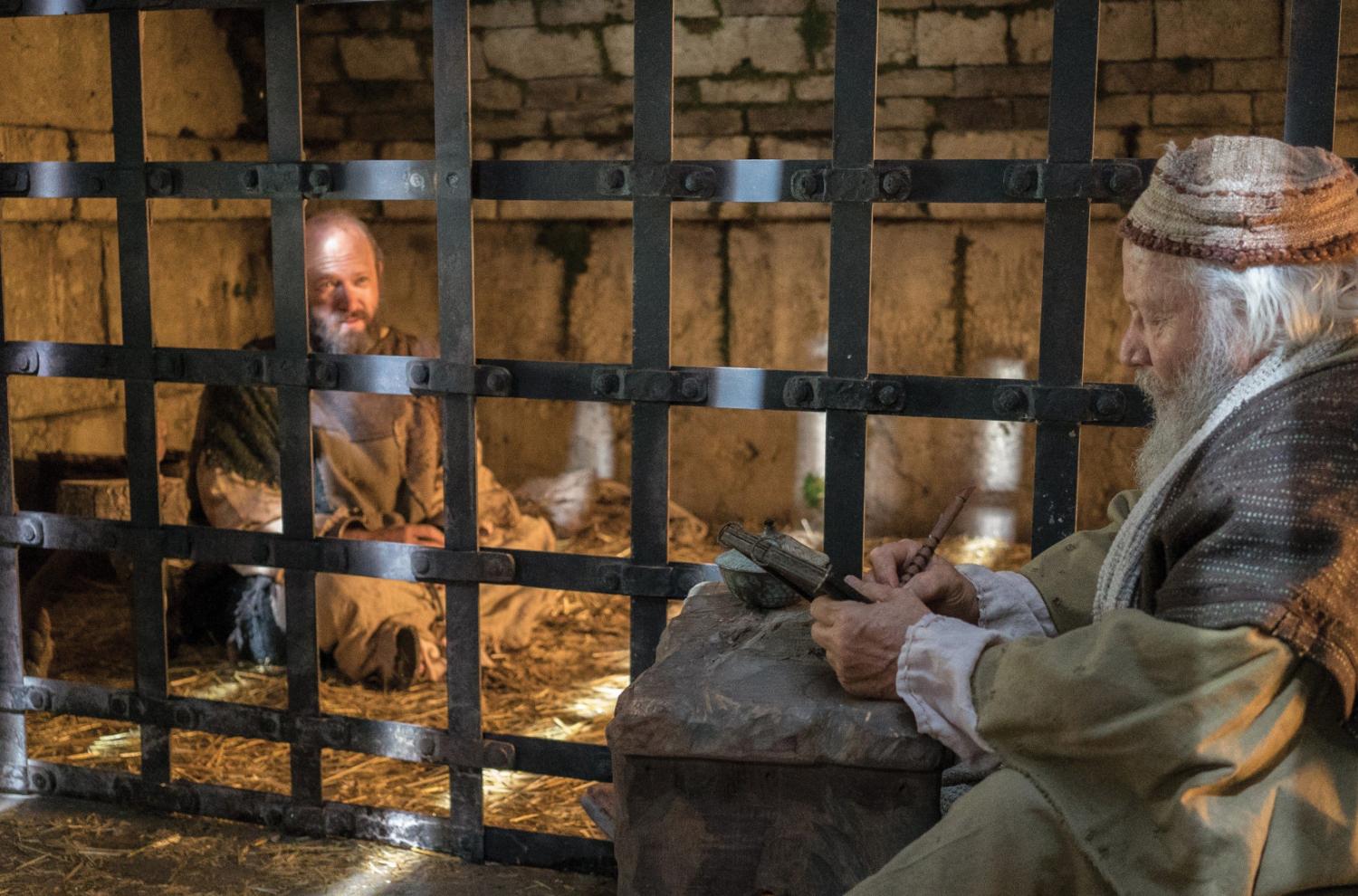 Paul dictates a letter from a jail cell. Image from Bible Videos of The Church of Jesus Christ of Latter-day Saints.